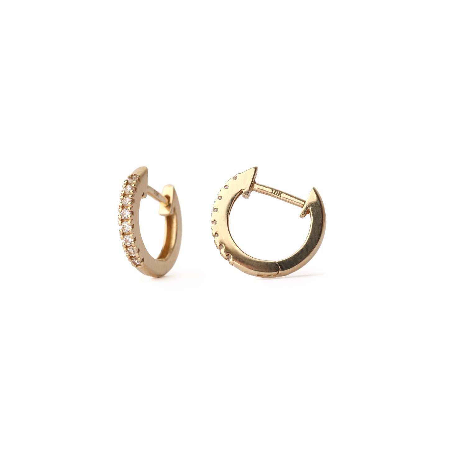 Gold hoop earrings with small diamonds on a white background