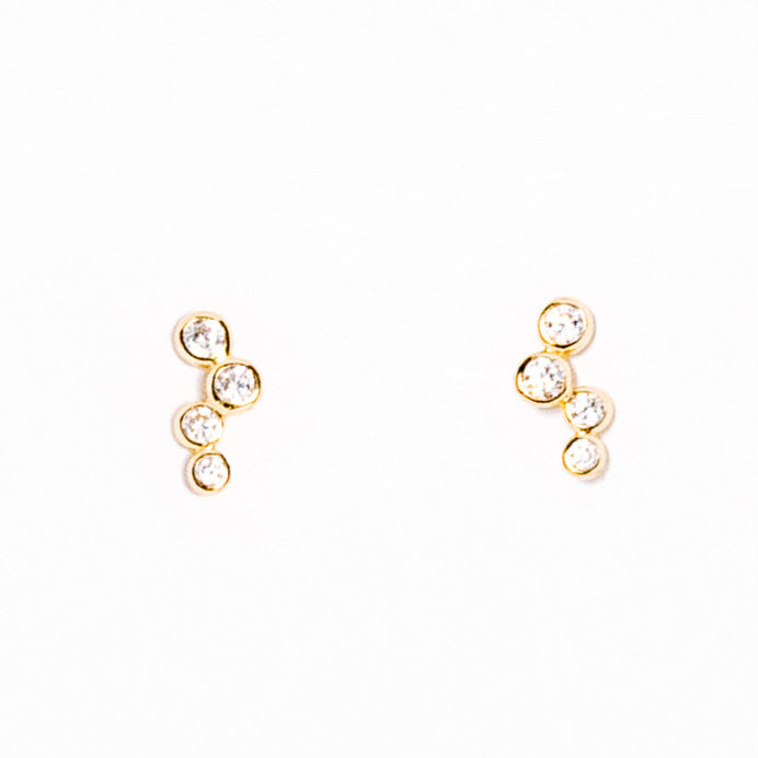 Pair of gold earrings with small pearls on a white background