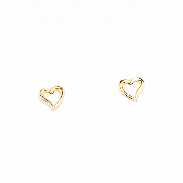 Two gold heart-shaped earrings on a white background