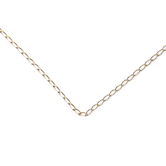 Gold chain necklace on a white background