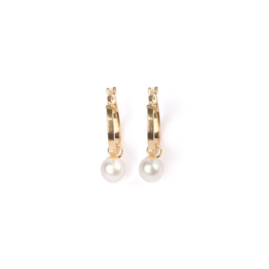 A pair of solid yellow gold hoop earrings with freshwater pearl drops on a white background