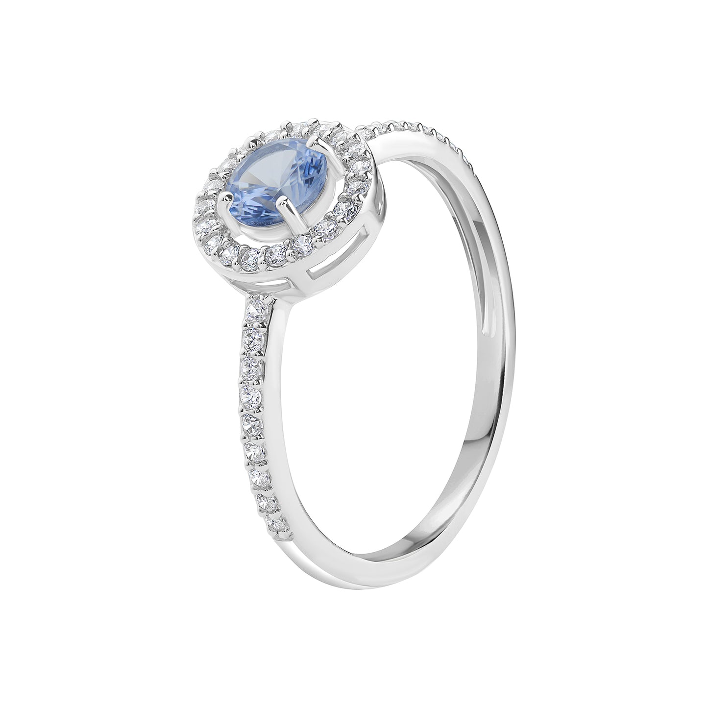 Women's rhodium plated sterling silver ring with blue centre stone of cubic zirconia. The centre stone is surrounded by small clear cubic zirconia gemstones and the shoulders of the ring are set with cubic zirconia. The ring is displayed on a white background