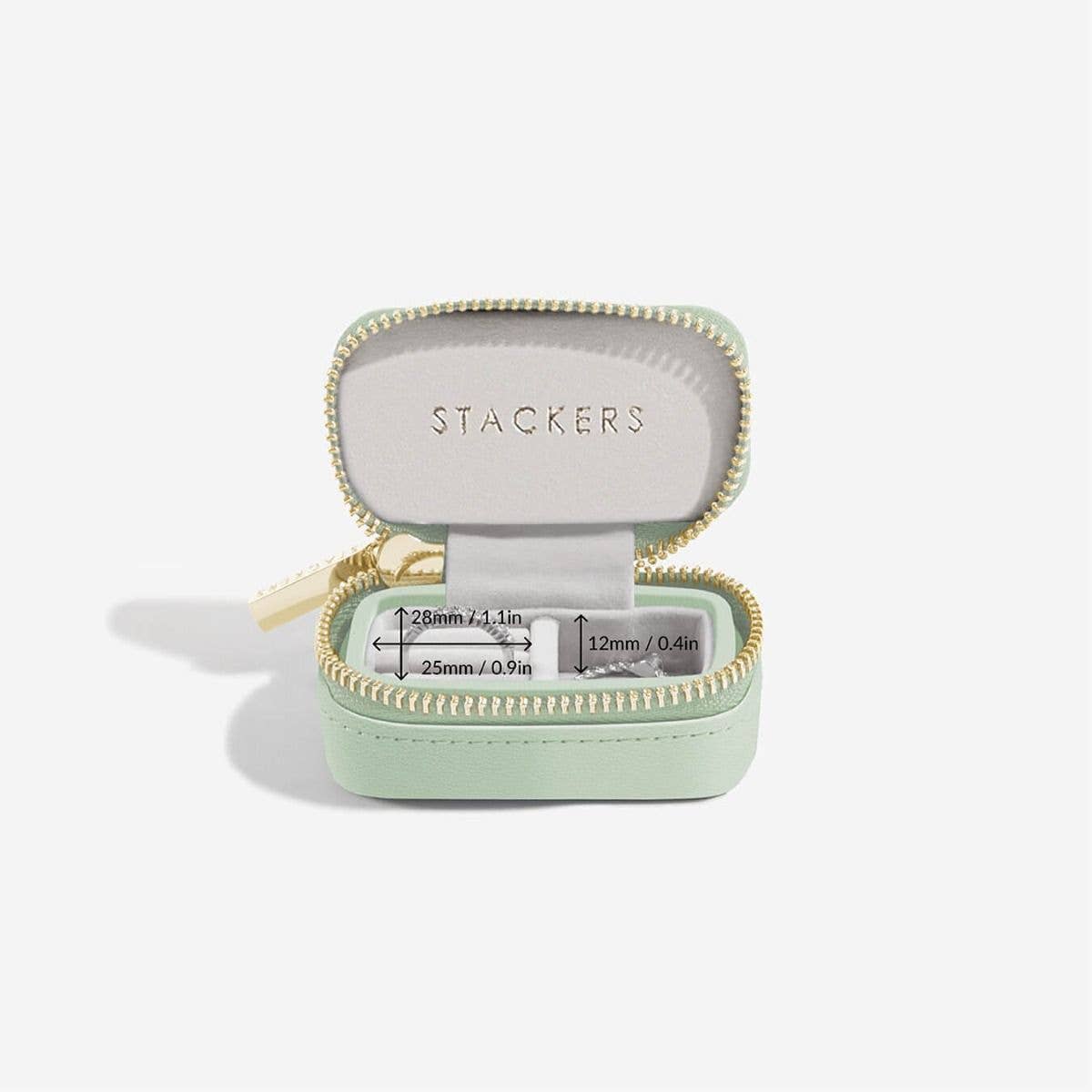 Mini mint green travel jewellery case with gold zipper, internal dimensions shown and 'Stackers' branding on a white background
