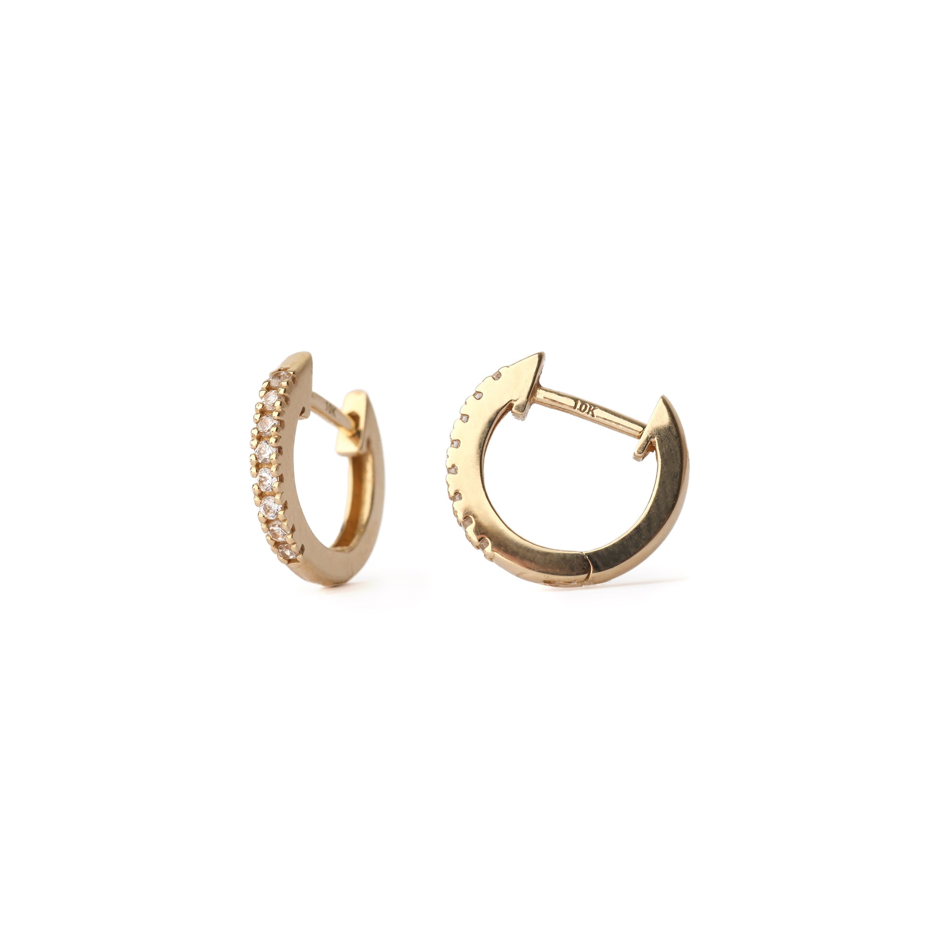 Gold hoop earrings with small diamonds on a white background