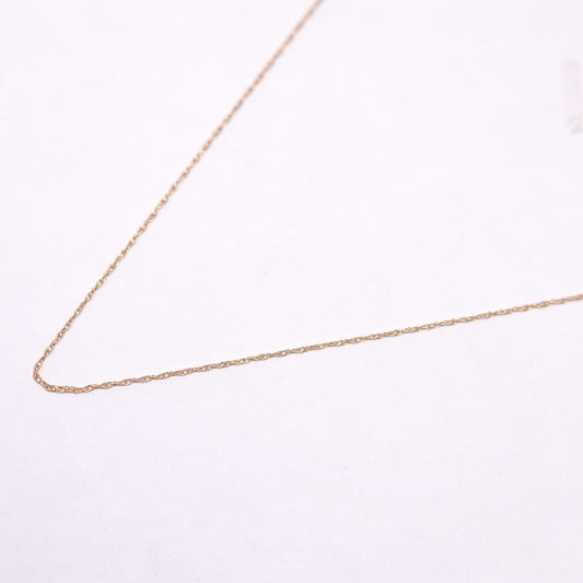 Gold chain on a white background