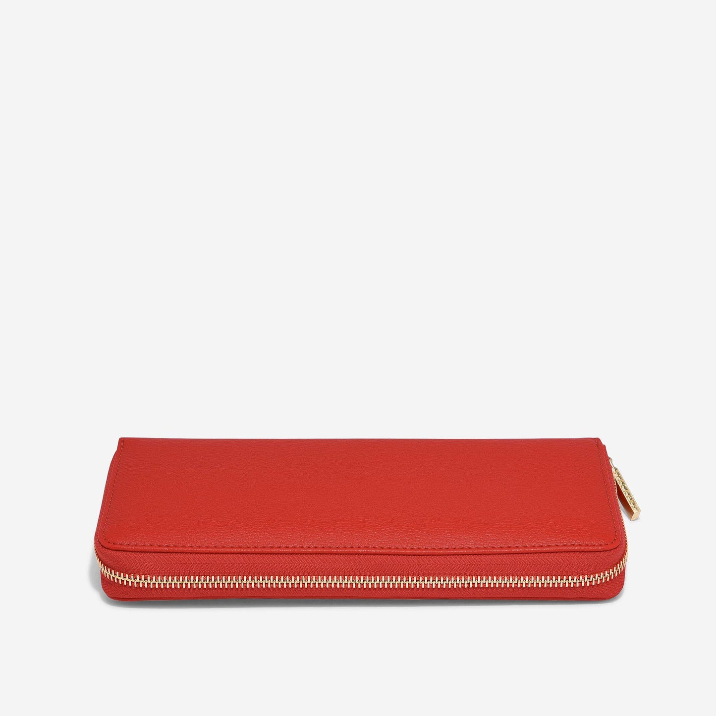 Red wallet with a gold zipper on a white background