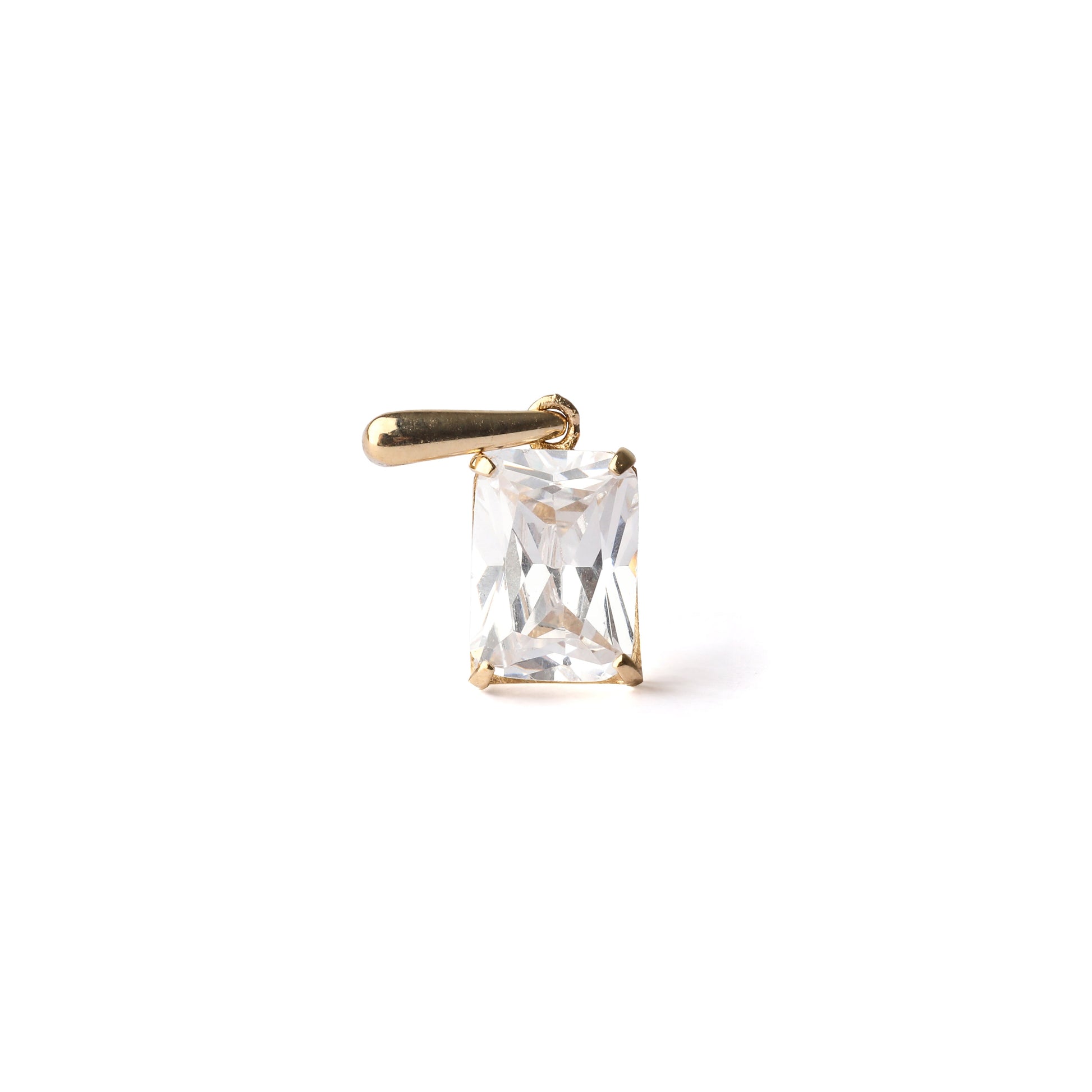 Women's 9K solid yellow gold and emerald cut cubic zirconia gemstone on a white background