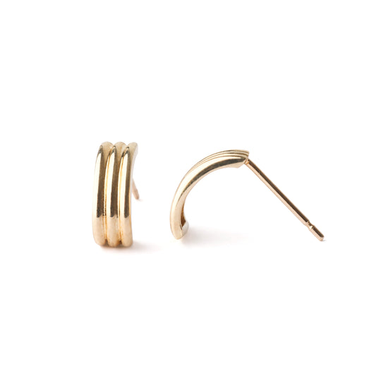 Gold hoop earrings on a white background