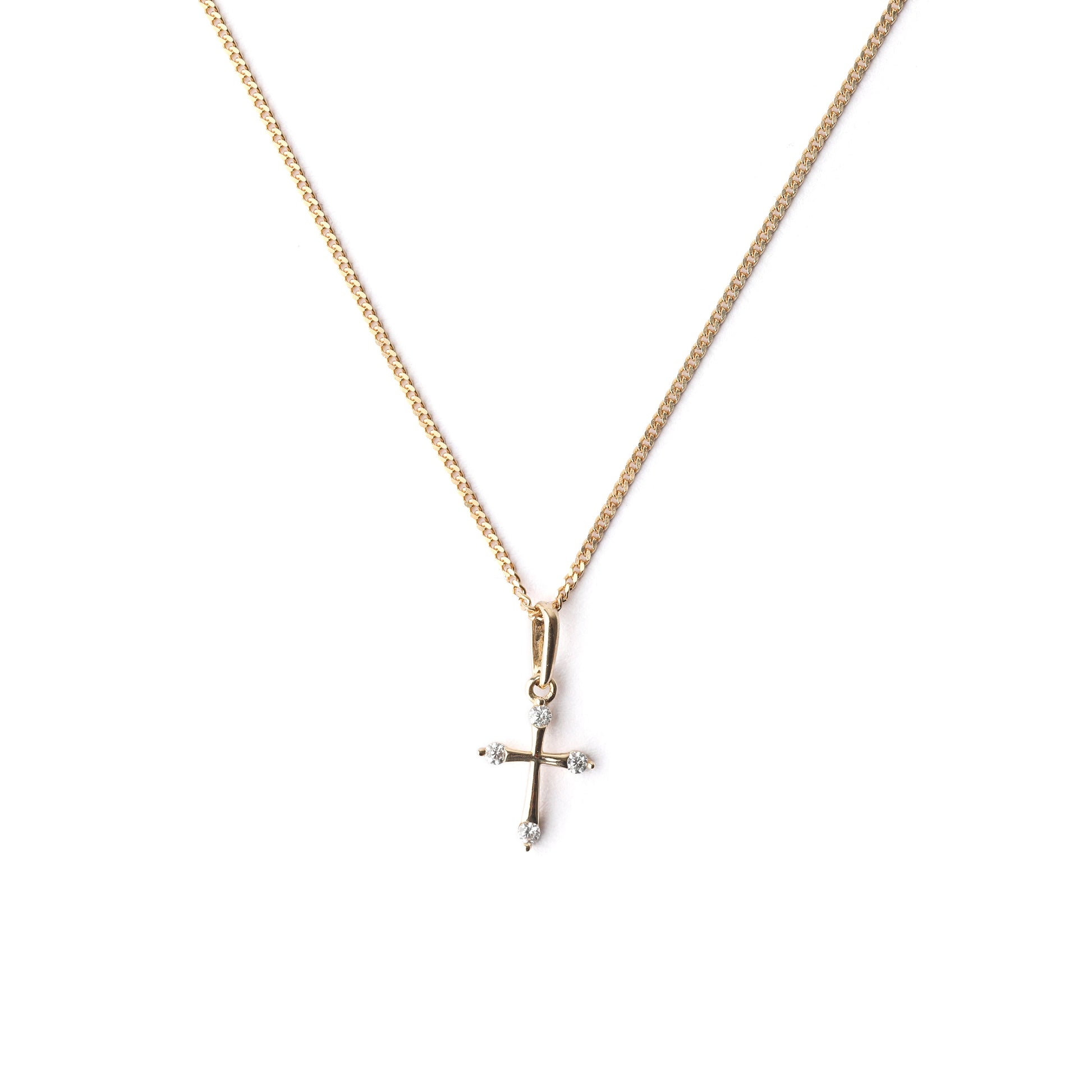 Gold necklace with a cross pendant on a white background
