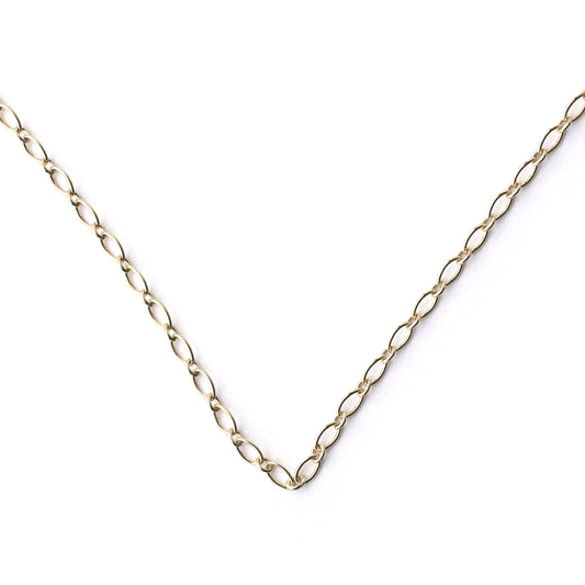 Gold chain necklace on a white background