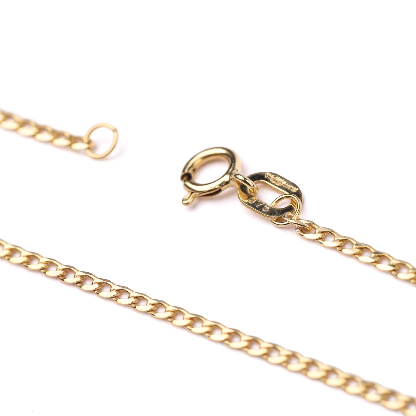 Women's 9K solid yellow gold faceted flat curb chain necklace with with clasp showing hallmark 375 on a white background