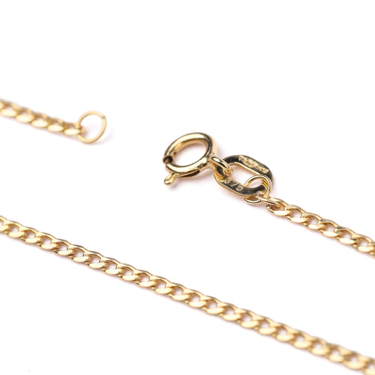 Women's 9K solid yellow gold faceted flat curb chain necklace with with clasp showing hallmark 375 on a white background