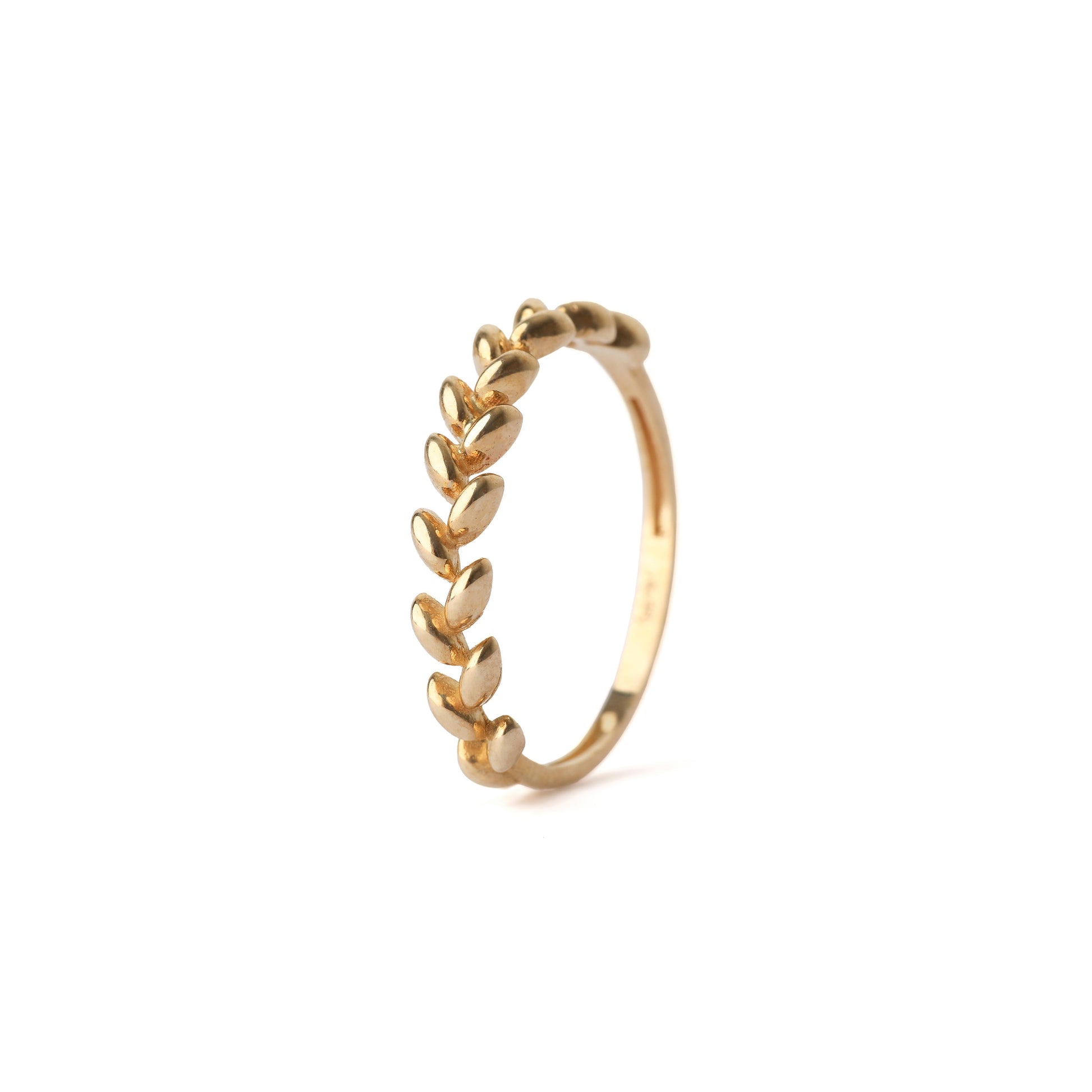Women's solid yellow gold leaf design ring displayed on a white background
