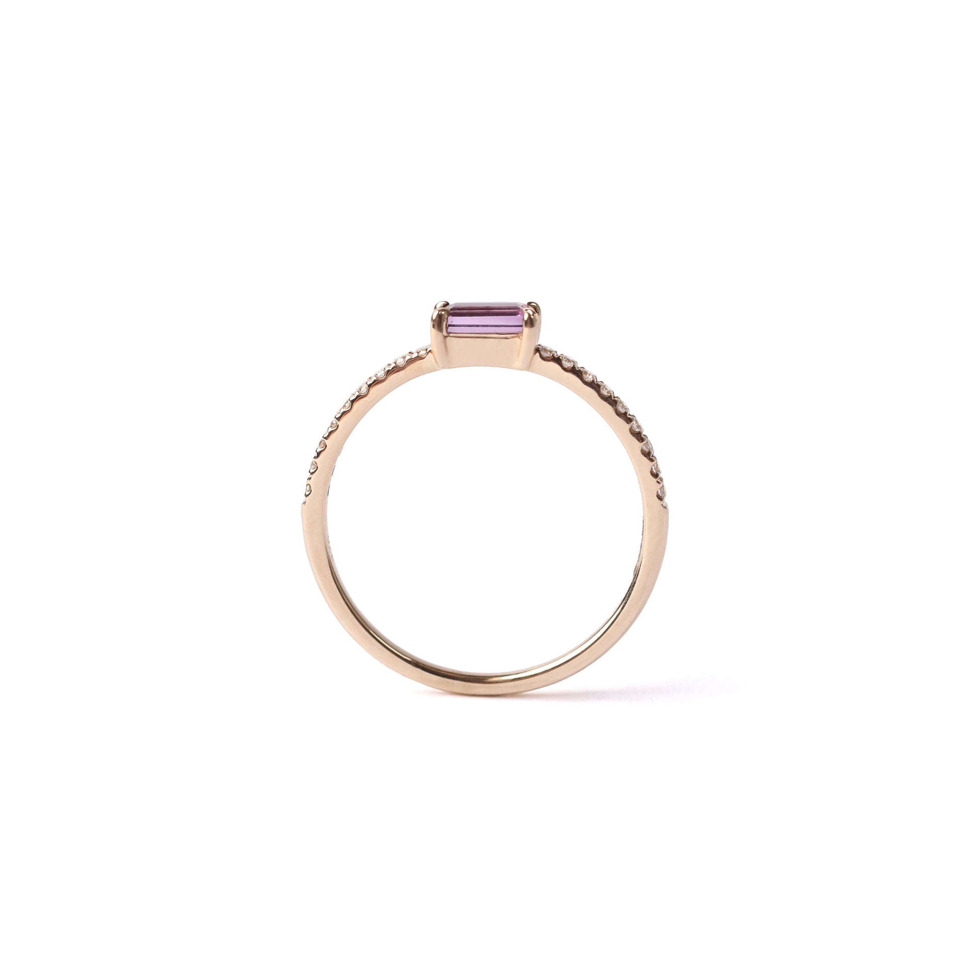 Women's solid yellow gold ring set with a central purple amethyst gemstone and small round diamonds on the shoulders each side of the amethyst, displayed on a white background upright.