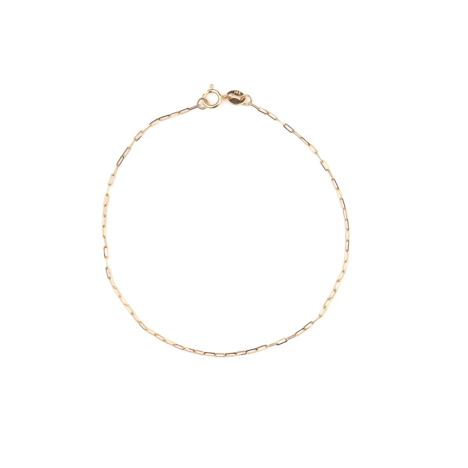 Women's solid gold paperclip chain bracelet on a white background