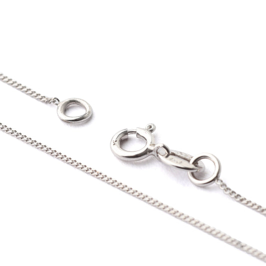 Women's 9K solid white gold chain necklace with clasp on a white background