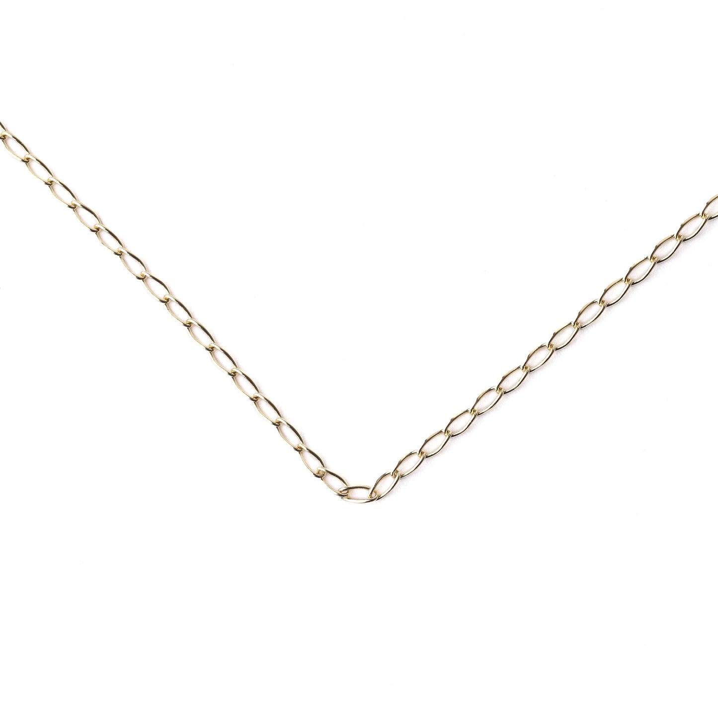 Women's 9K solid yellow gold 2mm curb chain necklace in a v laying on a white background