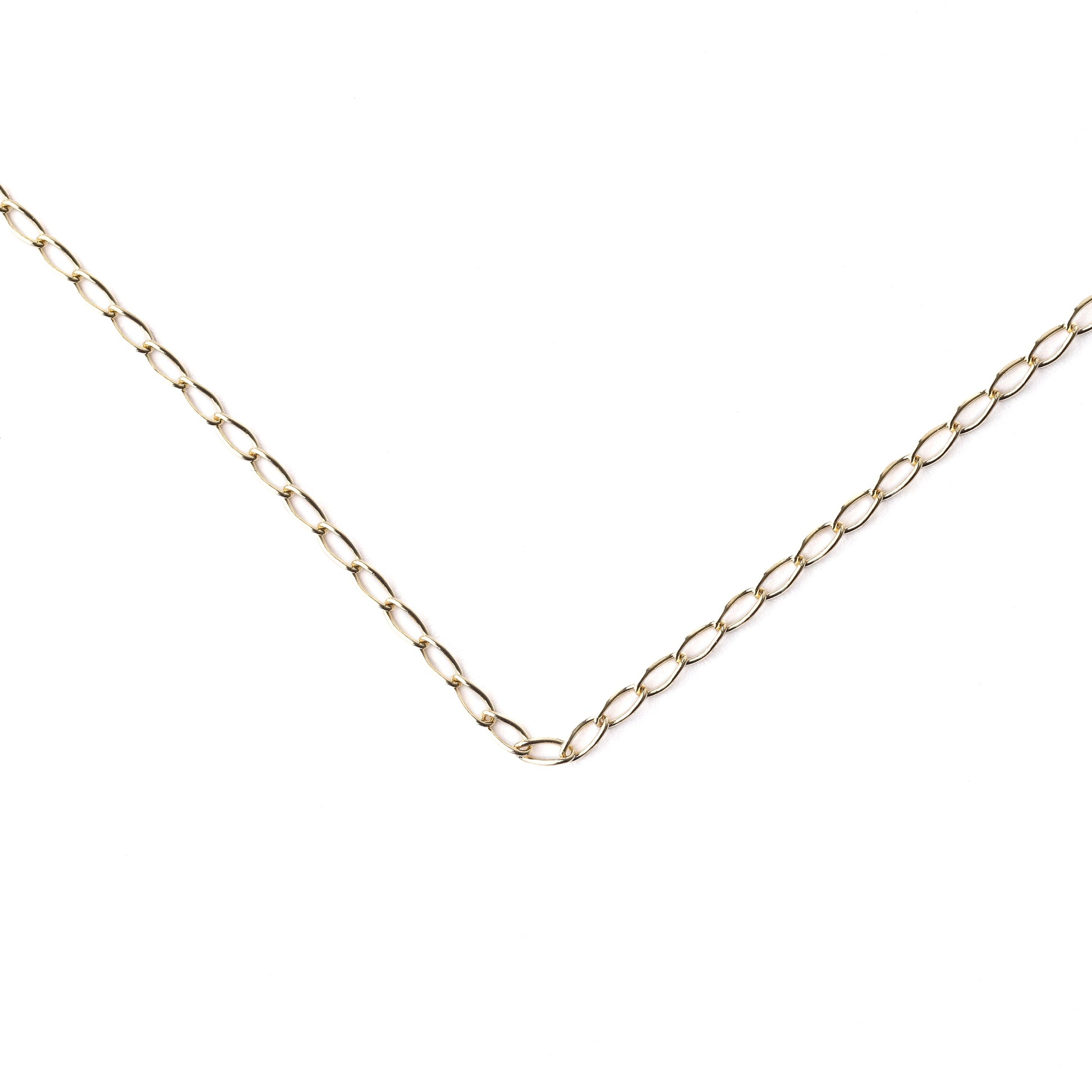 Women's 9K solid yellow gold 2mm curb chain necklace in a v laying on a white background