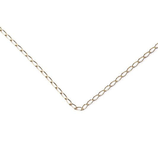 Women's 9K solid yellow gold 2mm curb chain necklace in a v laying on a white background