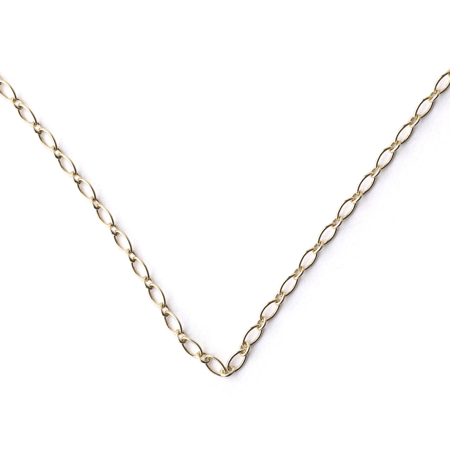 Women's 9K solid yellow gold 2mm oval trace chain necklace in a v shape on a white background