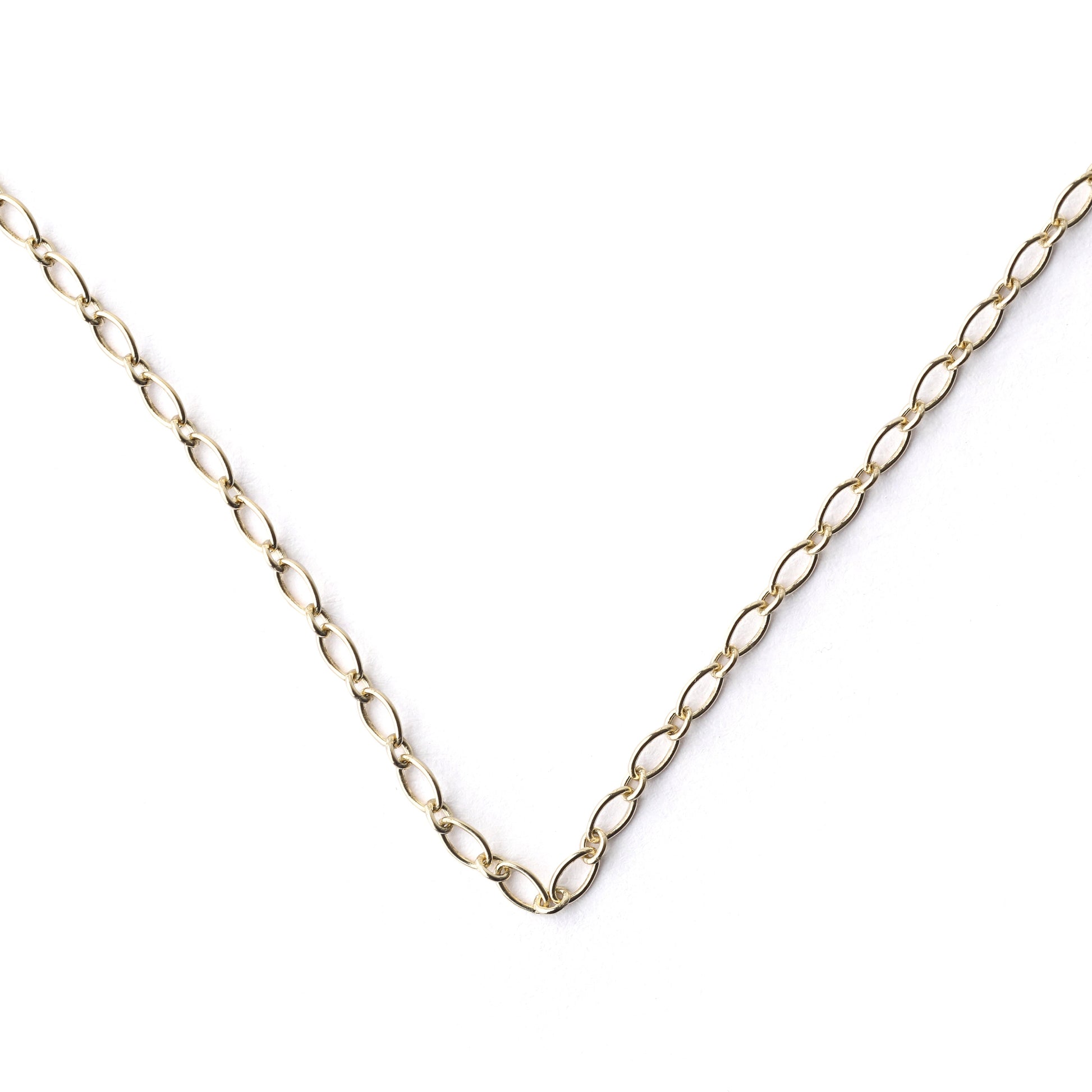 Women's 9K solid yellow gold 2mm oval trace chain necklace in a v shape on a white background