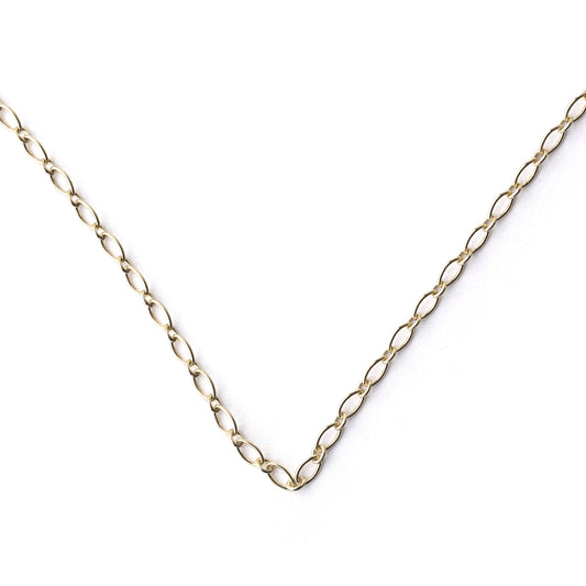 Women's 9K solid yellow gold 2mm oval trace chain necklace in a v shape on a white background
