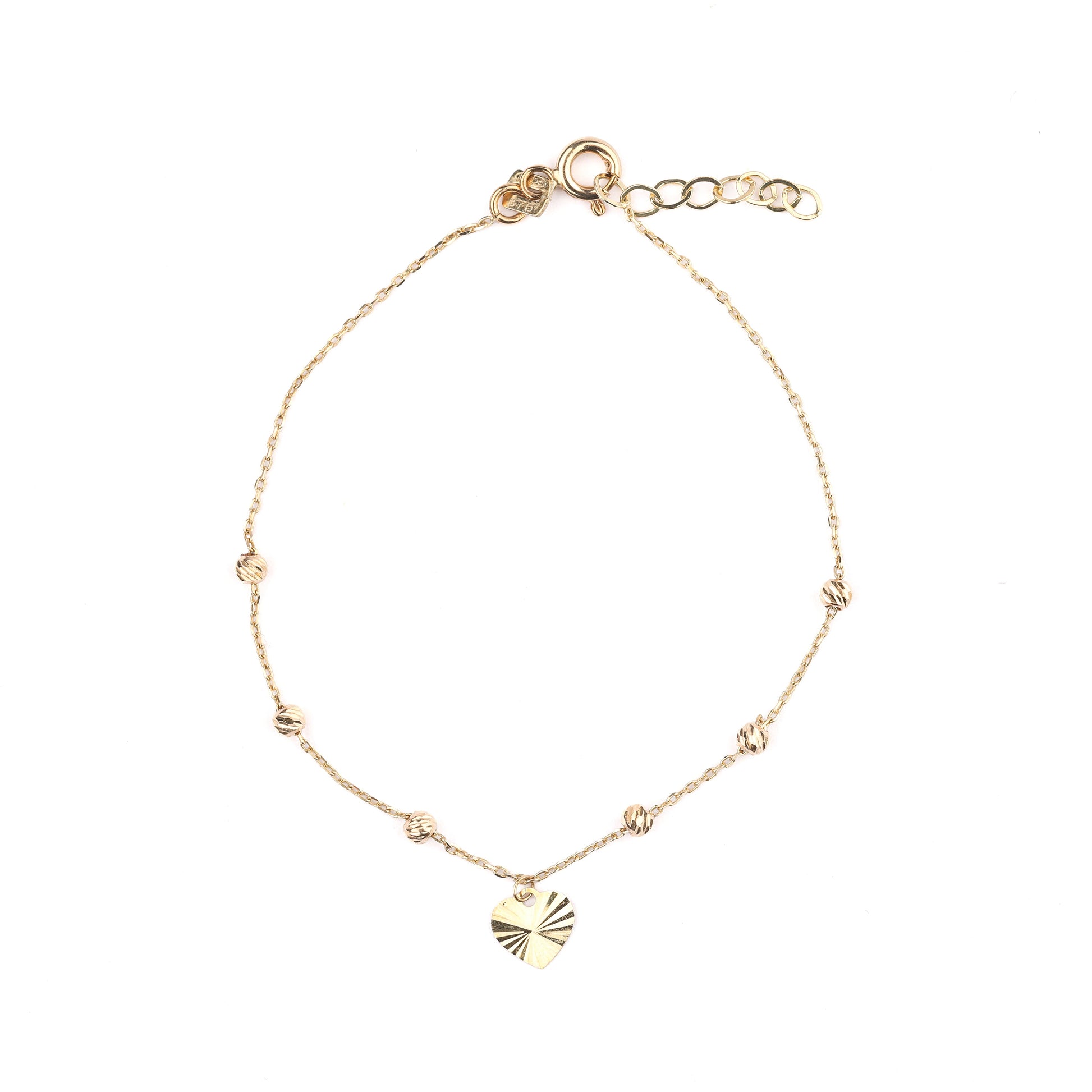 Women's 9K solid yellow gold bracelet with a detailed heart charm on a white background