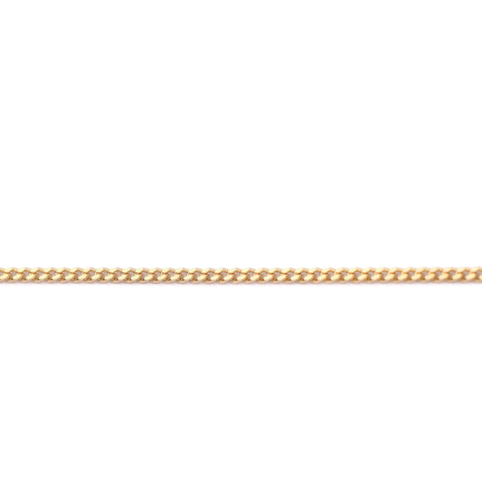 Women's 9K solid gold diamond cut curb chain necklace on a white background