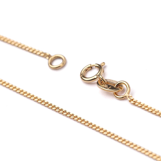Women's 9K solid yellow gold diamond cut curb chain necklace with clasp on a white background