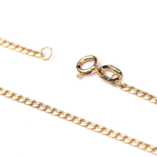 Women's 9K solid yellow gold faceted flat curb chain necklace with clasp on a white background