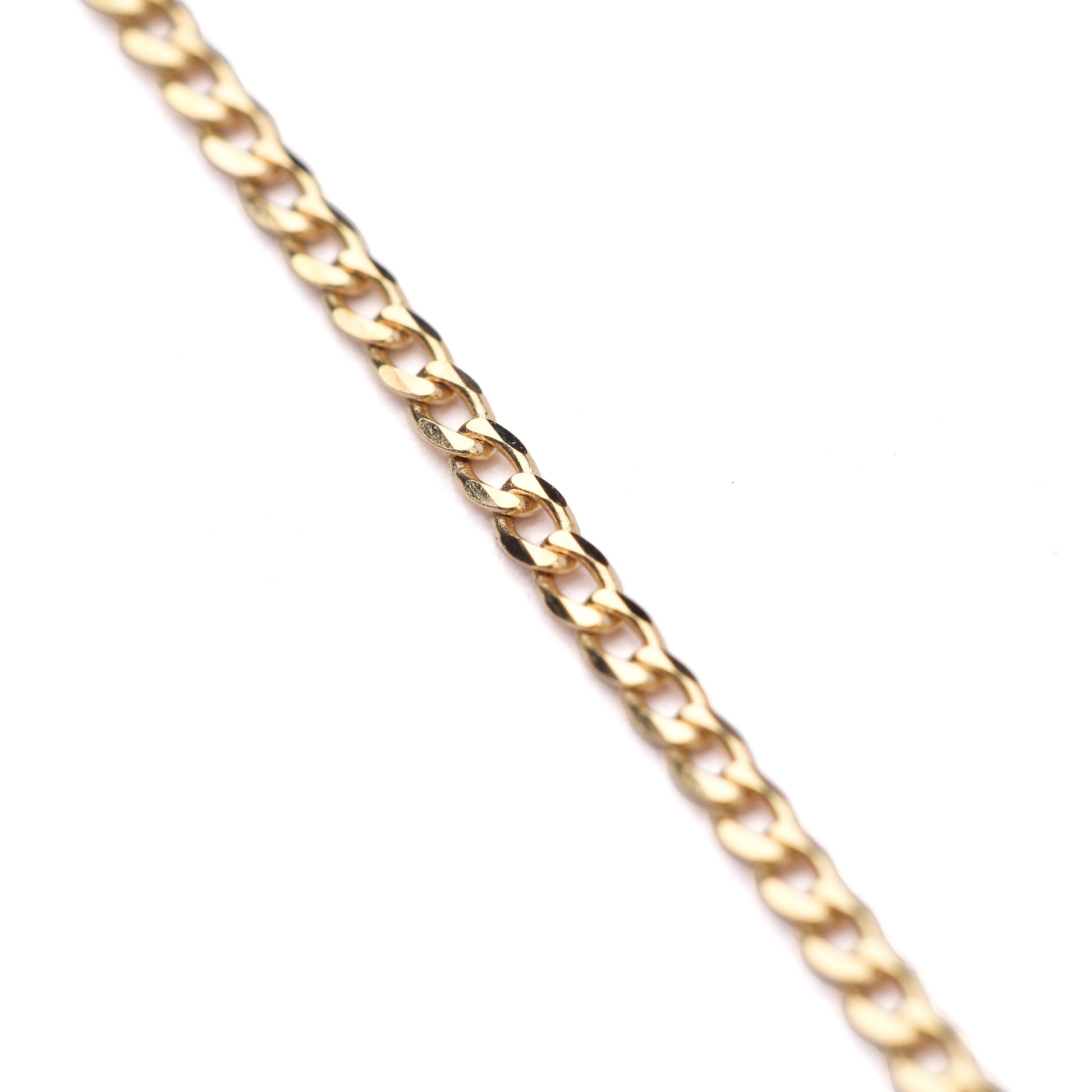 Women's 9K solid yellow gold faceted flat curb chain necklace on a white background