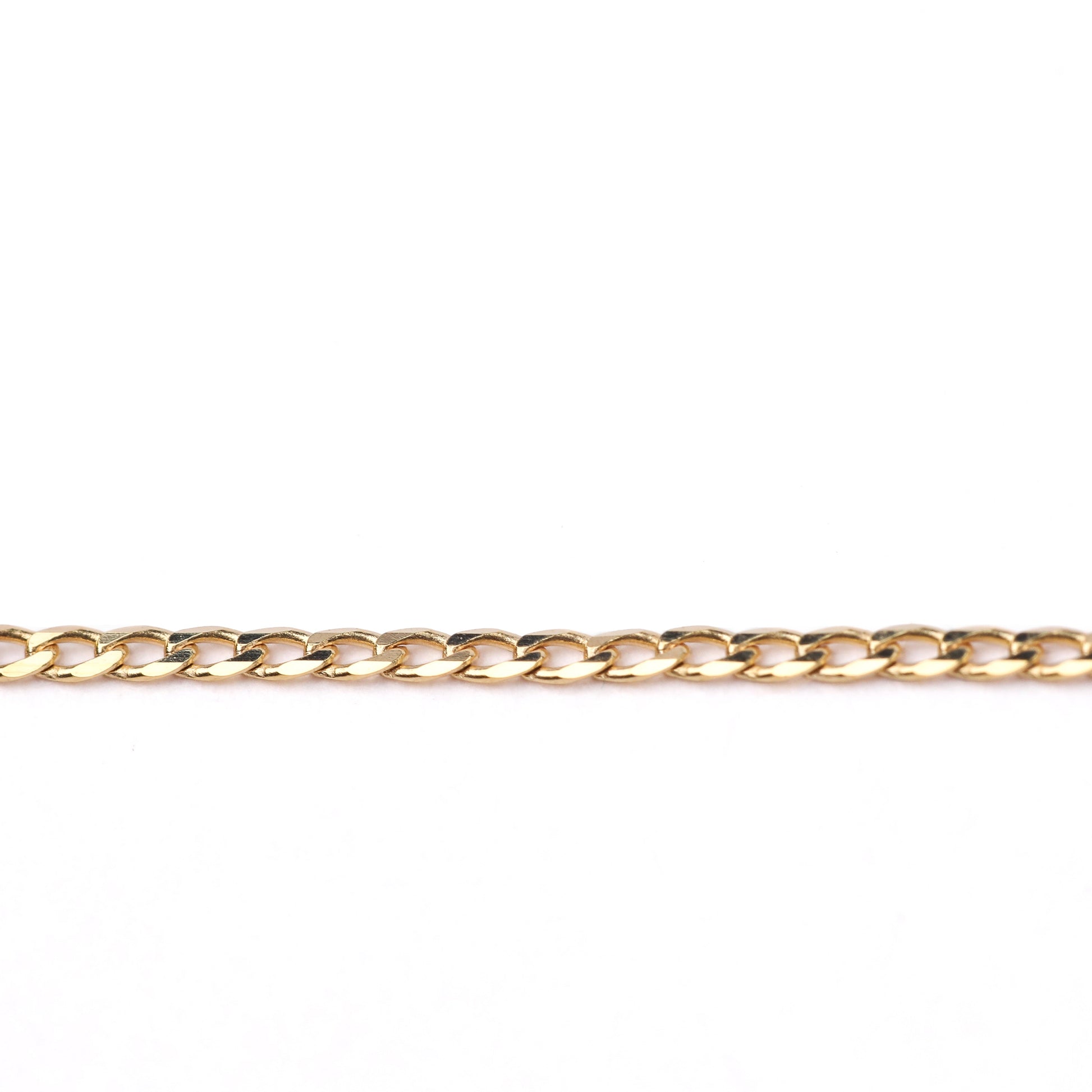 Women's 9K solid yellow gold faceted flat curb chain necklace on a white background