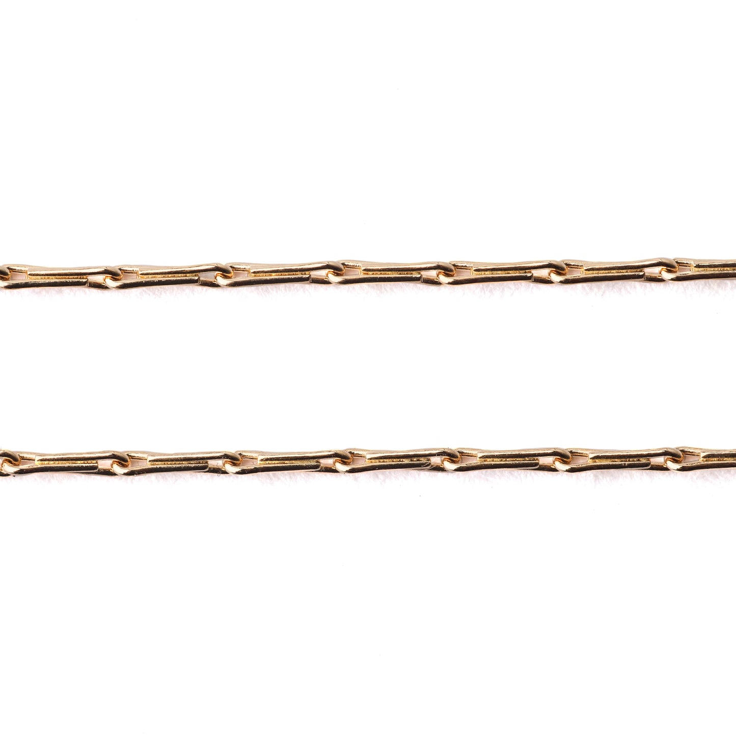 Women's solid 9K yellow gold hayseed chain necklace and bracelet on a white background