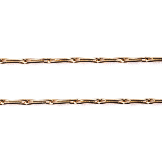 Women's solid 9K yellow gold hayseed chain necklace and bracelet on a white background