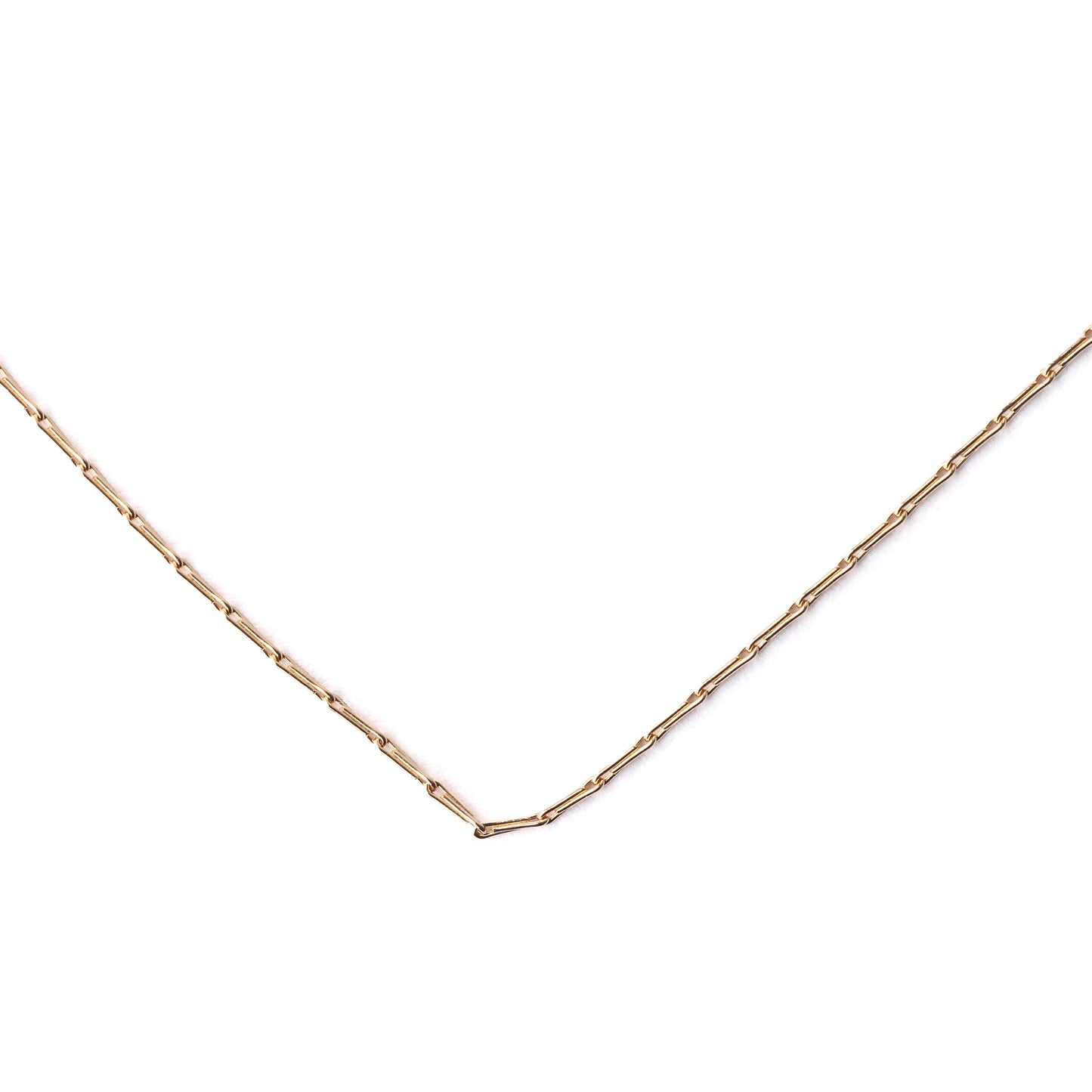 Women's solid yellow gold hayseed chain necklace on a white background