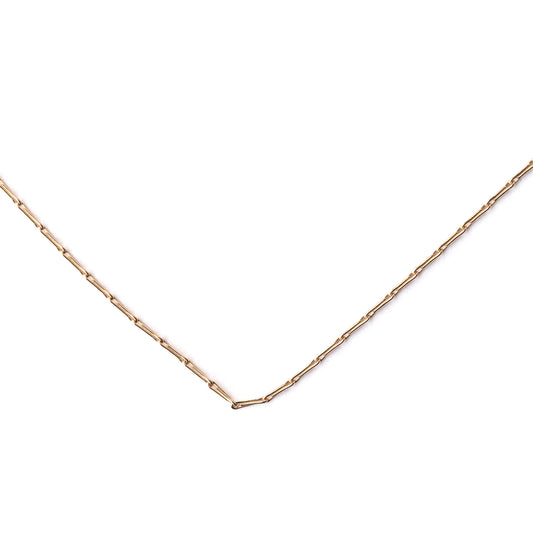 Women's solid yellow gold hayseed chain necklace on a white background