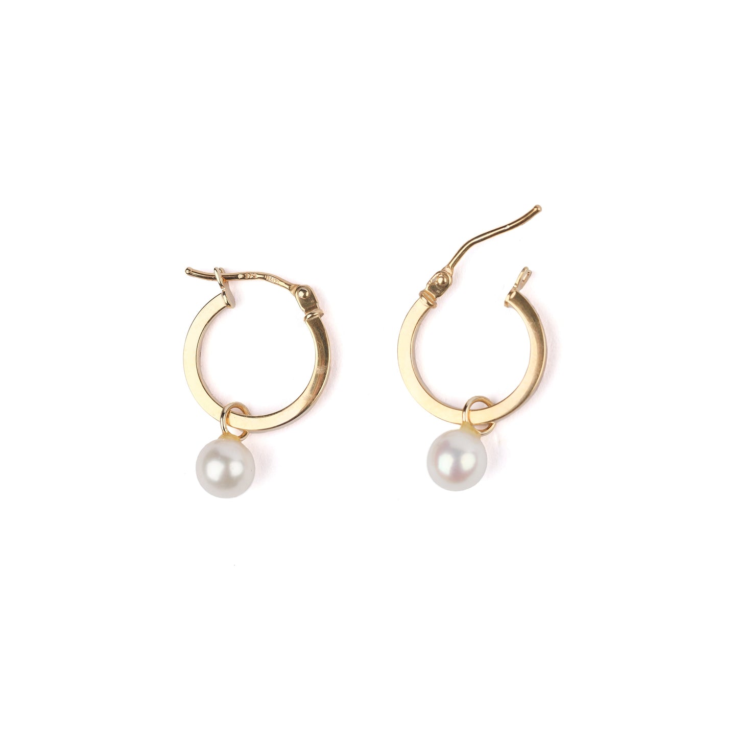 Women's solid gold hoop earrings with freshwater pearl drops on a white background