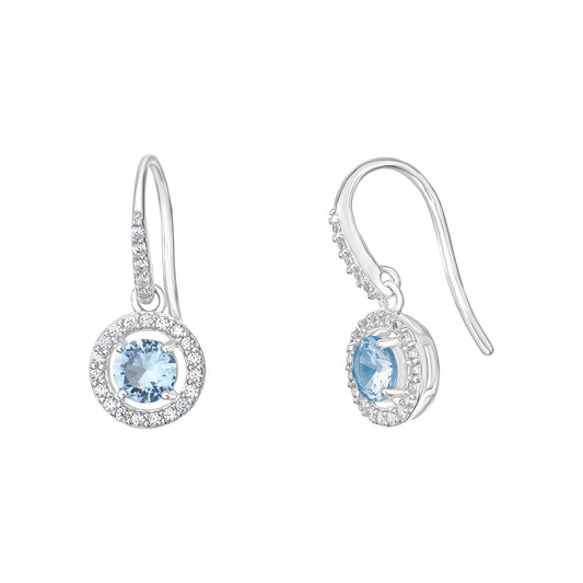 A pair of women's rhodium plated sterling silver earrings set with a central stone of blue cubic zirconia and surrounded by white cubic zirconia gemstones, shown on a white background