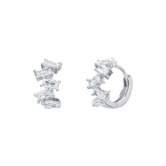 Women's rhodium plated sterling silver hoop earrings set with five emerald-cut cubic zirconia gemstones each on a white background