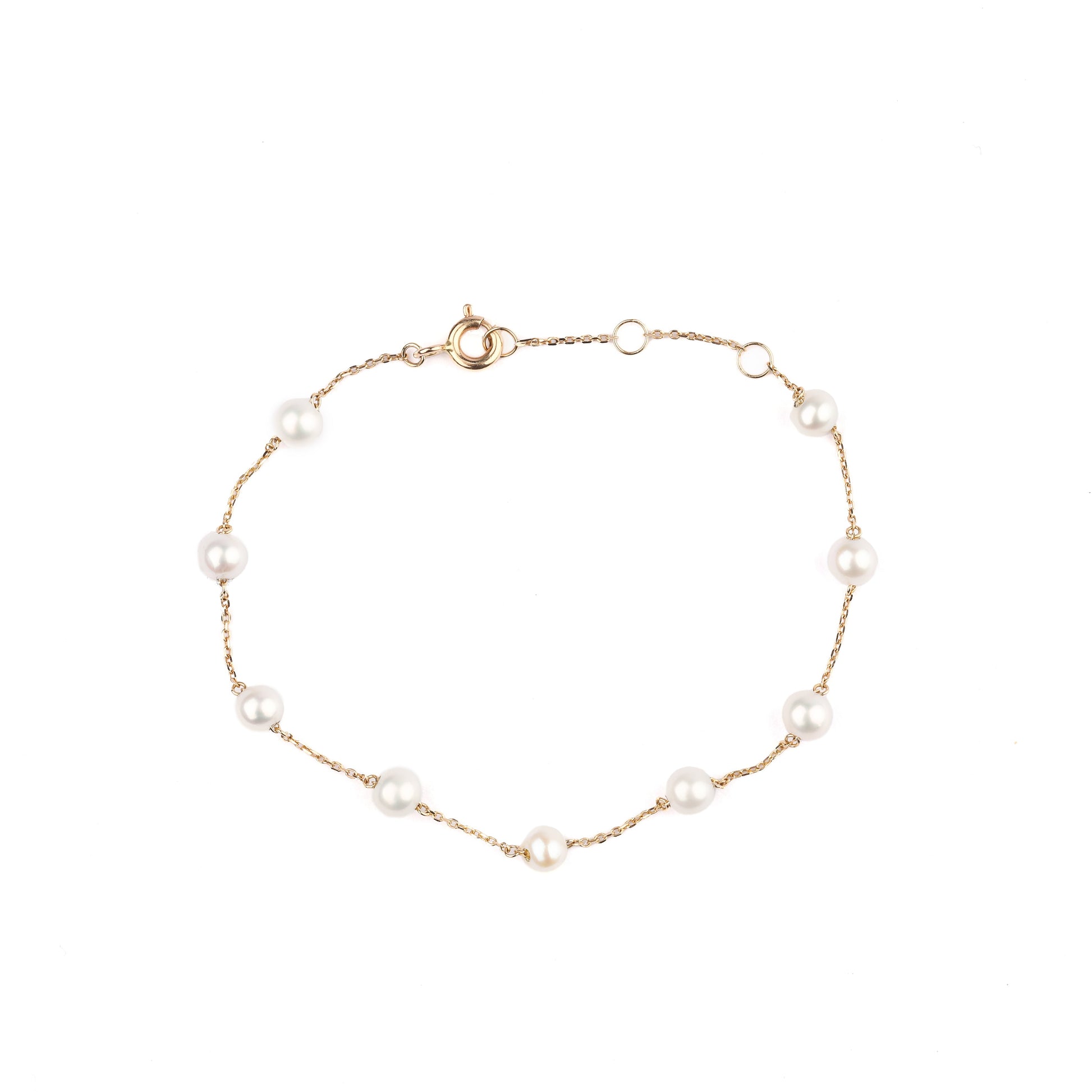 Women's solid gold bracelet with nine freshwater pearls spread evenly along the chain, displayed in a circle with the clap done up on a white backgroud