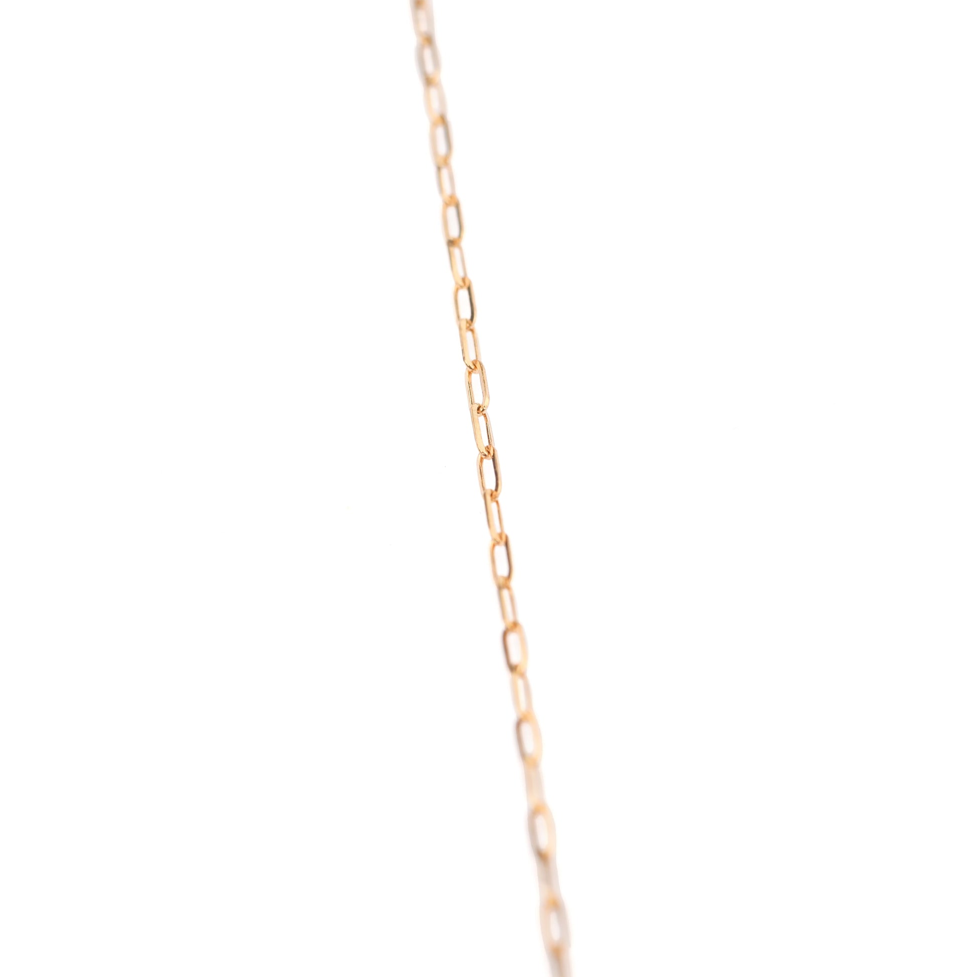 Women's 14K solid gold delicate thin paperclip style chain bracelet on a white background