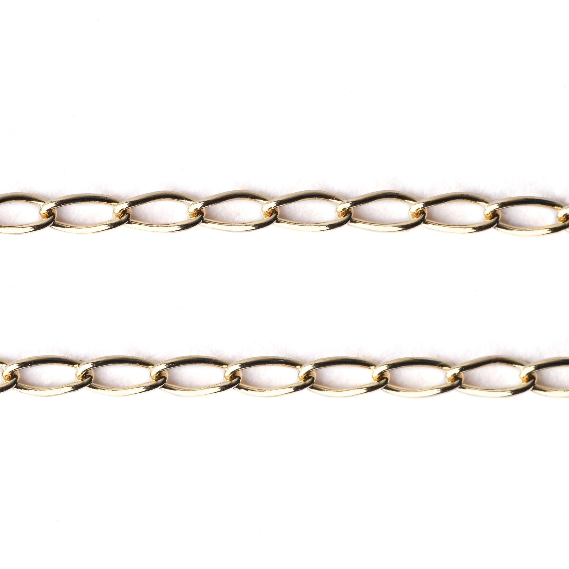 Women's solid gold 2mm curb chain bracelet on a white background