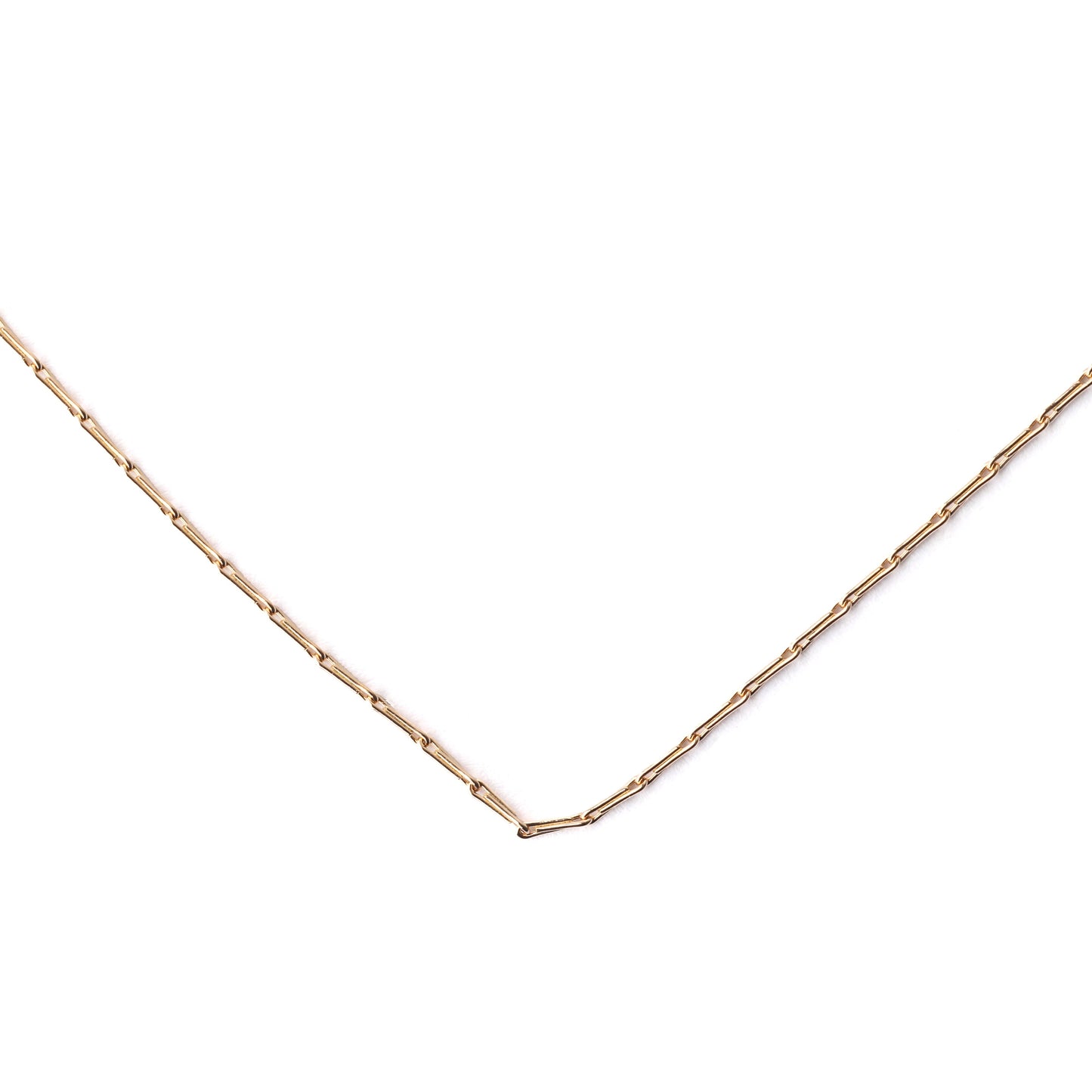 Women's solid yellow gold hayseed chain necklace on a white background