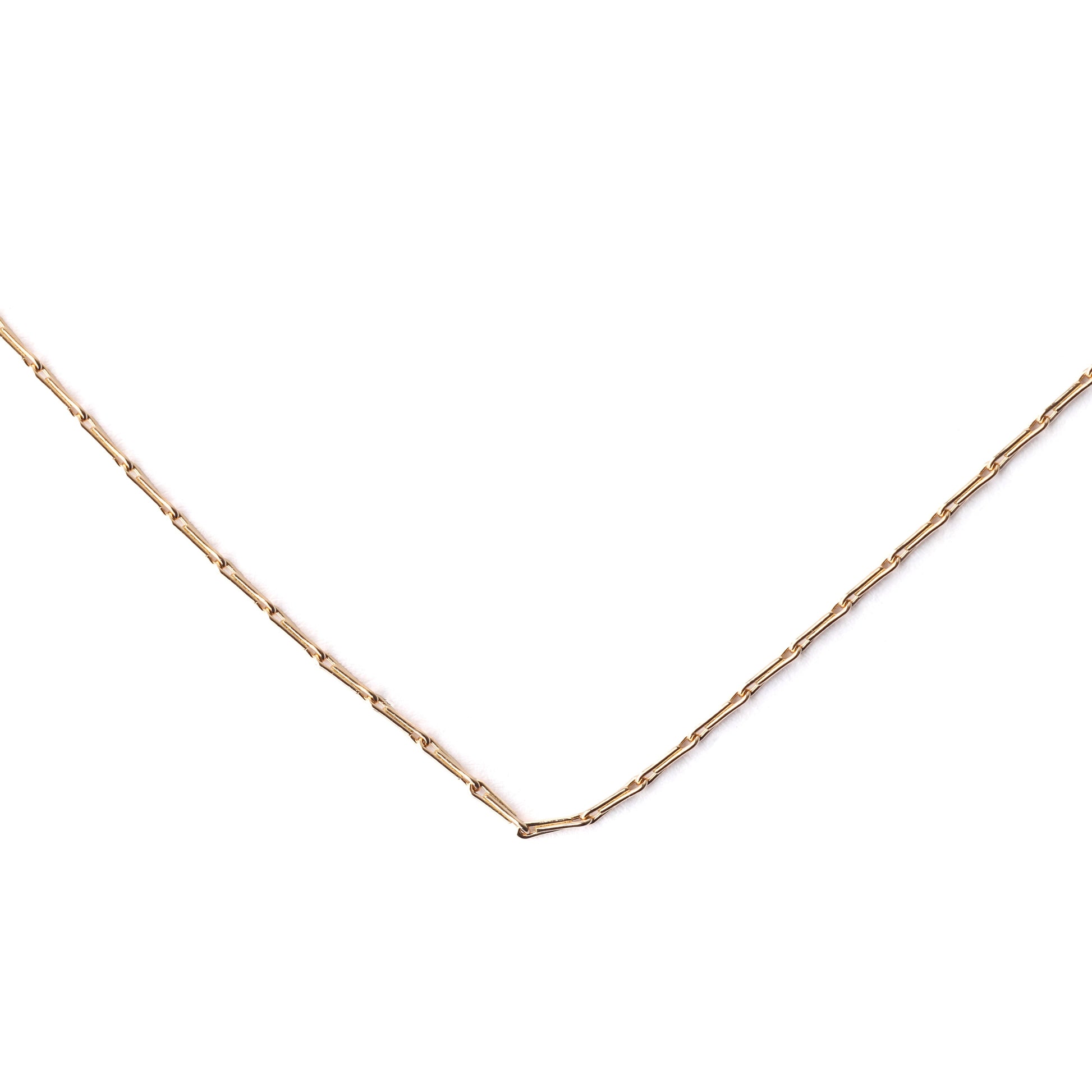 Women's solid yellow gold hayseed chain necklace on a white background