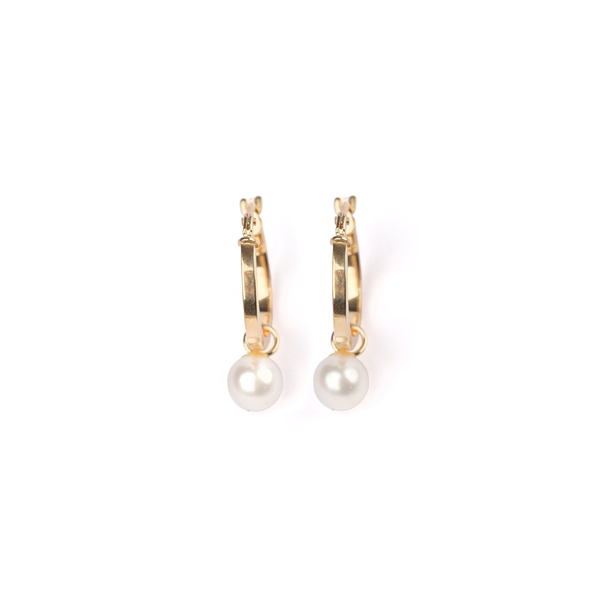 A pair of solid yellow gold hoop earrings with freshwater pearl drops on a white background