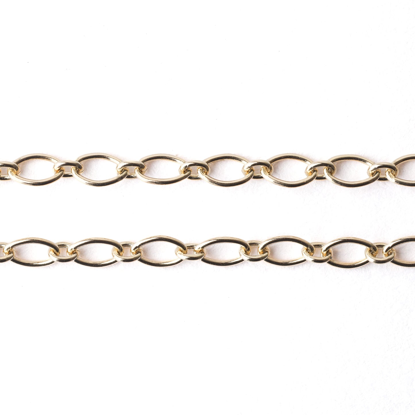 women's solid gold trace chain for bracelet and necklace on a white background