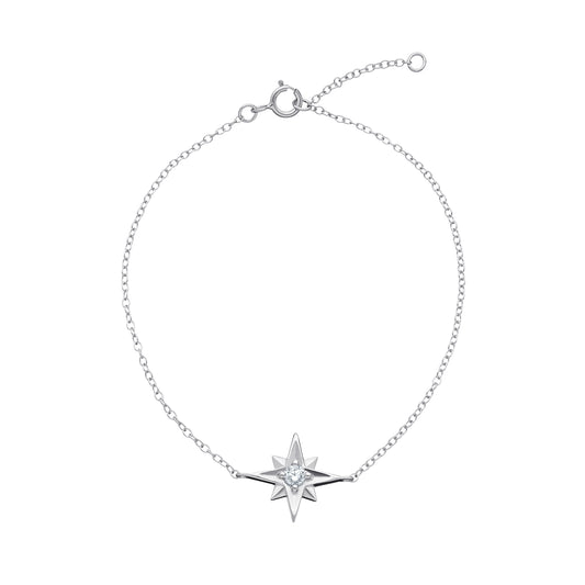 Women's rhodium plated sterling silver bracelet with a star-shaped pendant with a cubic zirconia centre gemstone on a white background