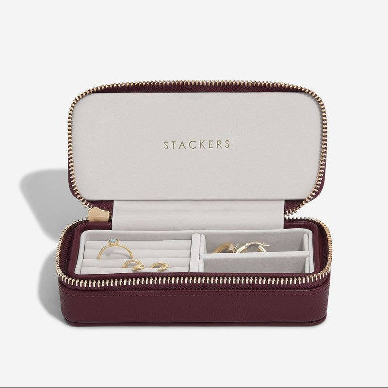 Medium burgundy travel jewellery box with 'Stackers' branding on a white background