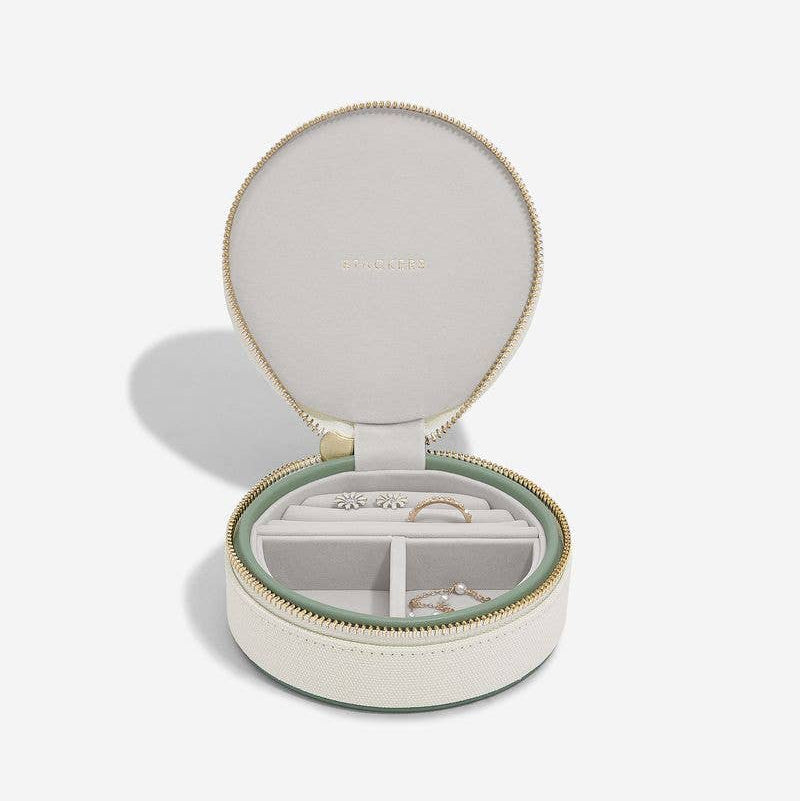 Green medium size Stackers travel jewellery box displayed open and on a white background