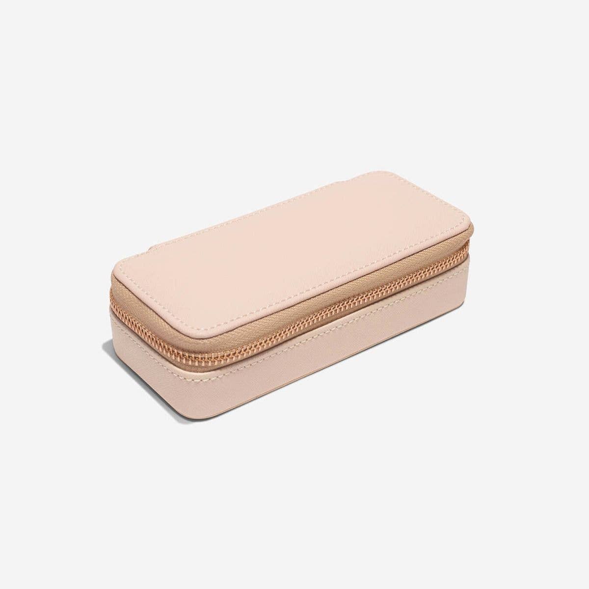 Stackers medium blush pink travel jewelry box with a zipper on a white background
